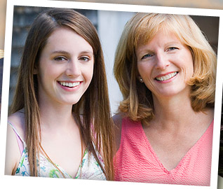 teen girl and woman smiling